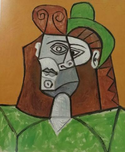 毕加索《戴绿帽子的女人》
